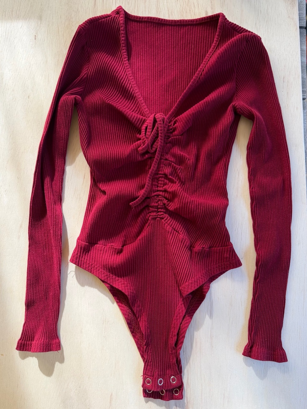 Ribbed Long-Sleeve Body Suit in Deep Wine Red